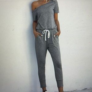Asymmetrical neck drawstring pocket side jumpsuit